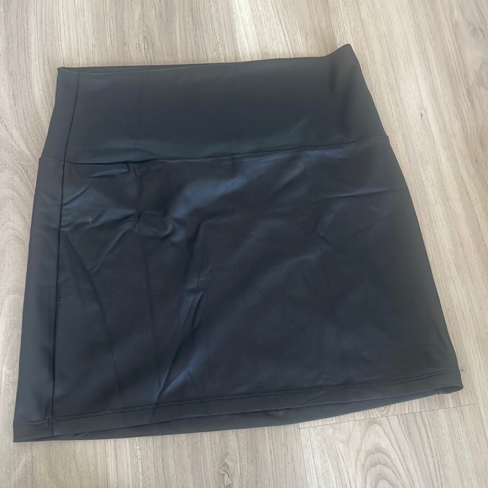Black leather mini skirt